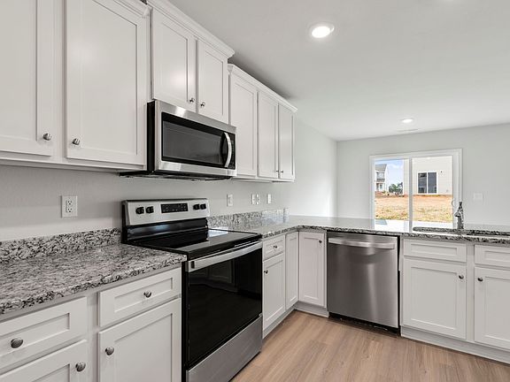 White cabinetry with hardware