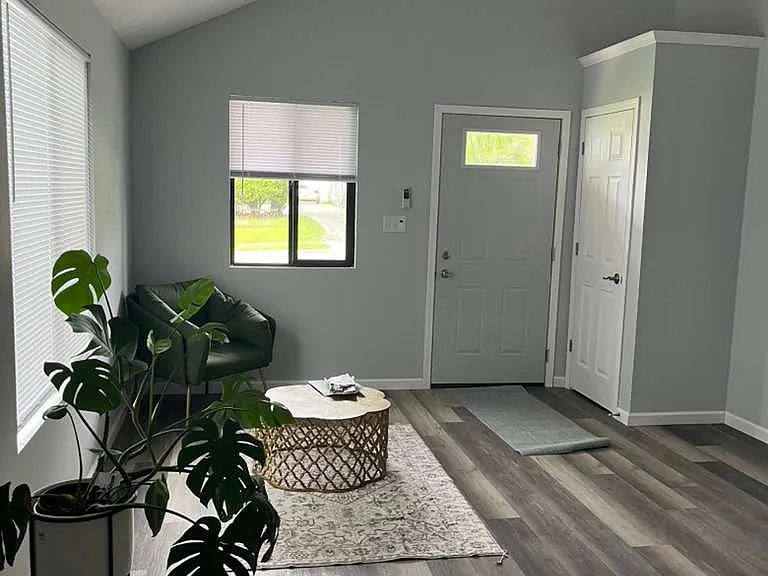 Living room and entrance. Slowly adding furniture :)