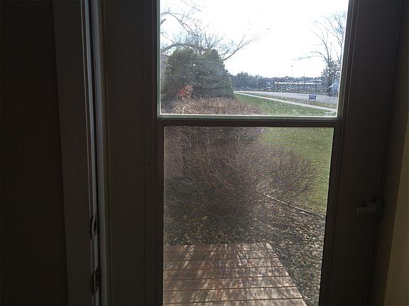 Out to the side patio from the living area