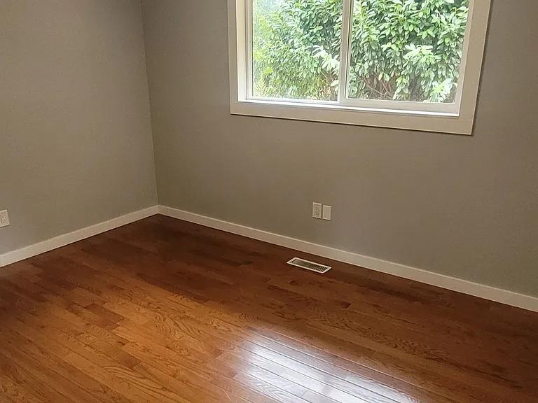 Master bedroom has new window and ceiling light/fan