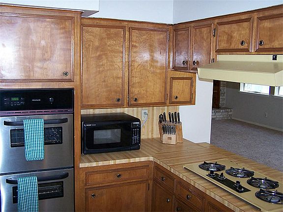 New stainless steel, double oven.