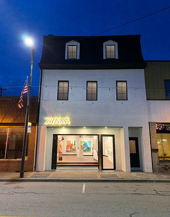 Live above an Art Gallery.