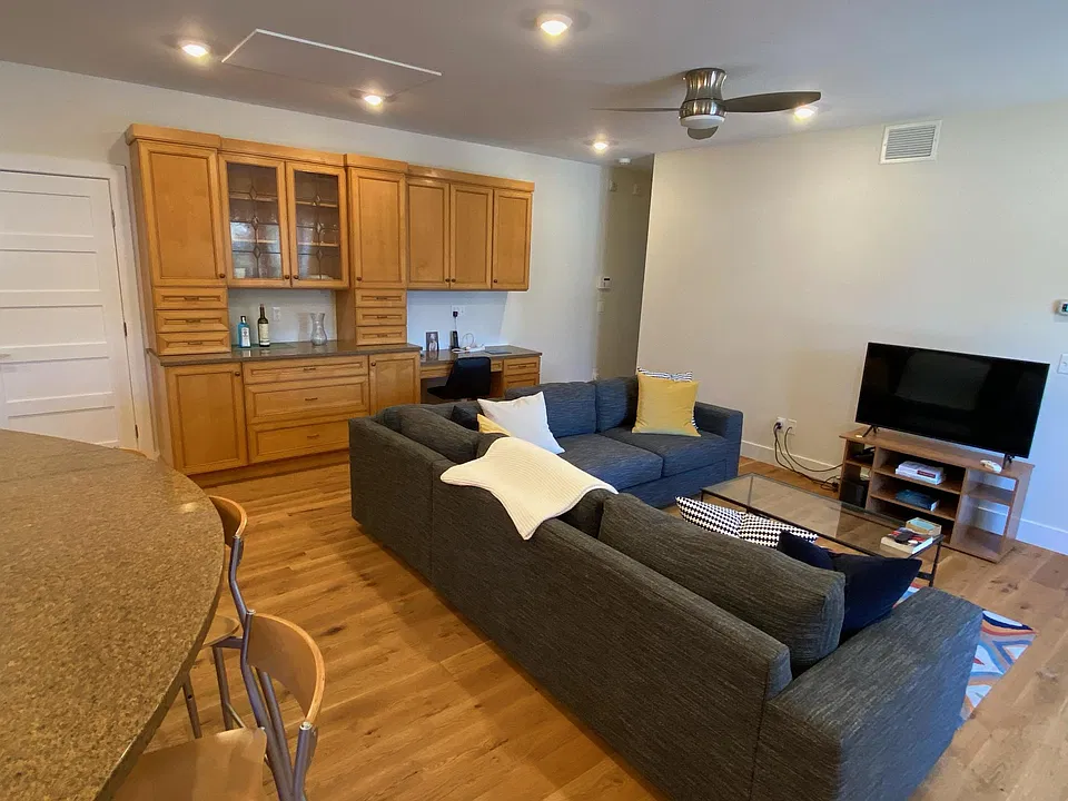 wine/liquor area with desk