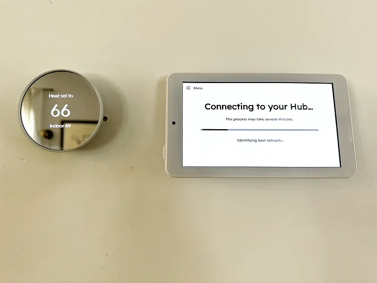 Nest thermostat and security alarm ready.