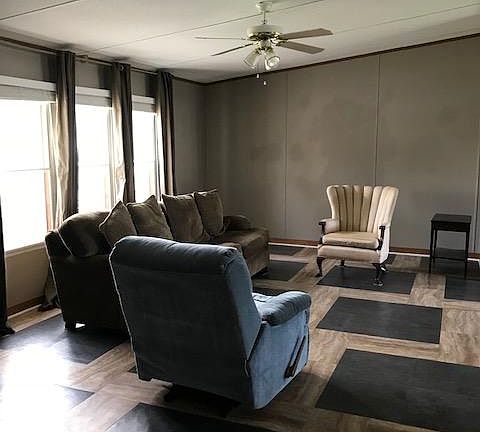 Living Room taken from the master bedroom entryway. Note: All the rooms have sloped ceilings which adds an expansive feeling to the rooms.