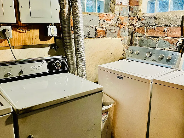 Basement with washer and dryer hook up.