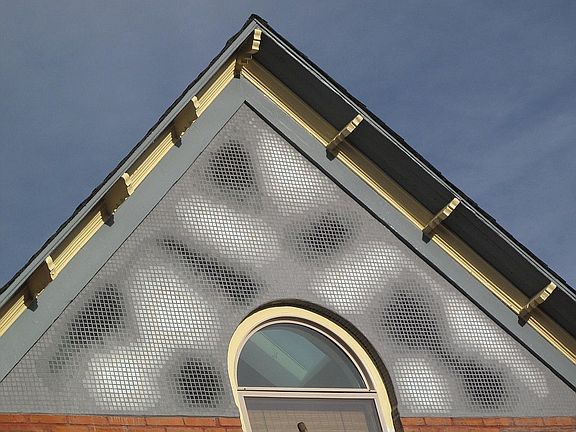 Front gable tile mosaic.