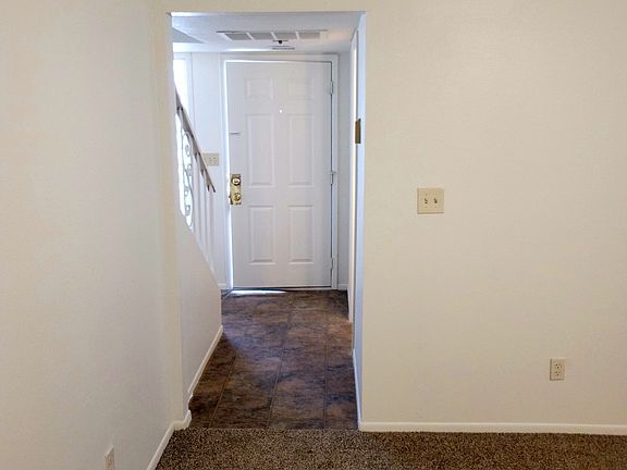 Interior front entry with powder room