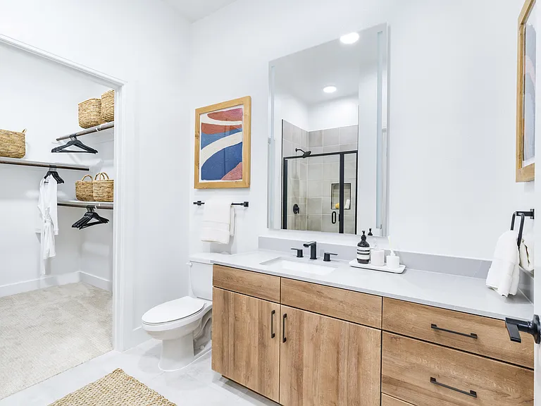 Luxuriate at Modera Trinity with designer bathrooms featuring double vanities and quartz countertops.