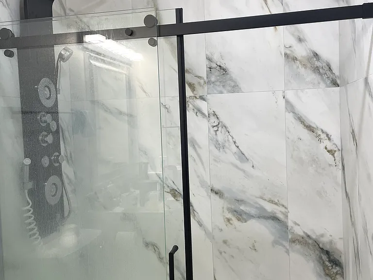 Modern master bath with bath tub and led multi-functional shower