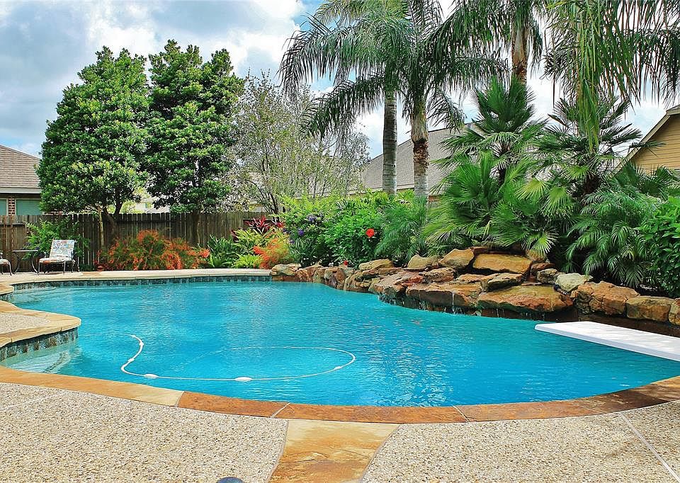 This inviting 5 bedroom, 3 full and 2 half bath home with salt water pool in the prestigious golf course community of Magnolia Creek is located on a cul-de-sac street just a short walk to Gilmore Elementary School in the highly desirable Clear Creek 