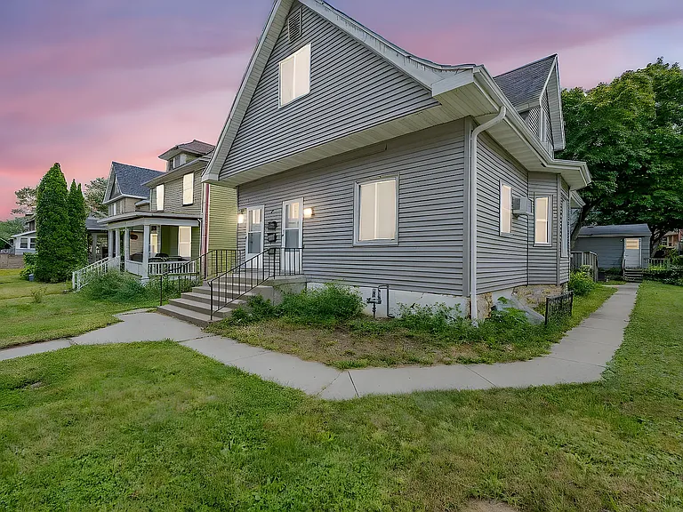 Exterior sidewalk to back yard.