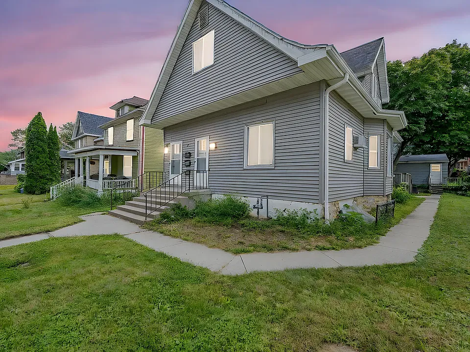 Exterior sidewalk to back yard.