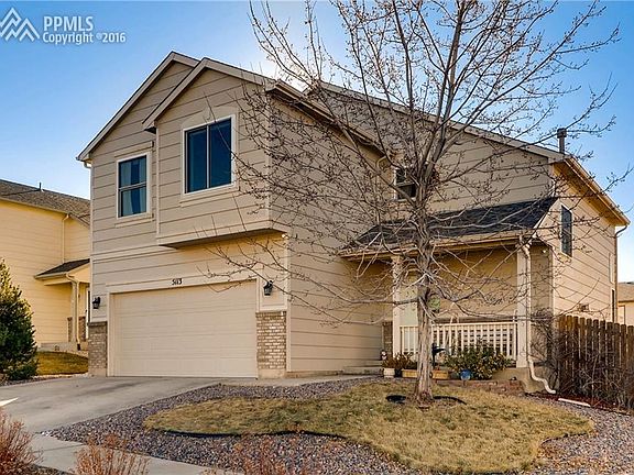 Driveway, 2 car garage.