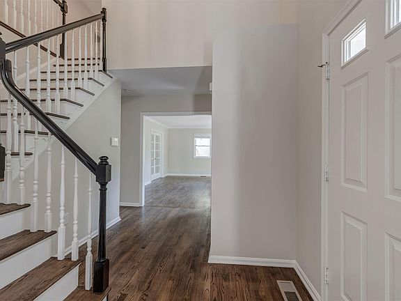 Entry Foyer featuring a Cathedral Ceiling