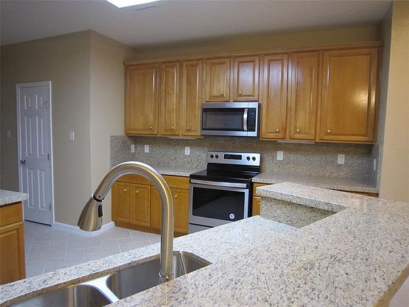 Granite Counters and Breakfast bar.