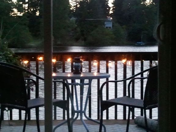 view of deck and lake