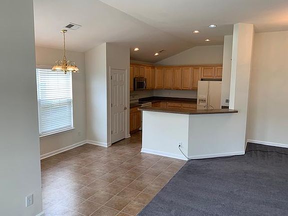Dining area next to kitchen
