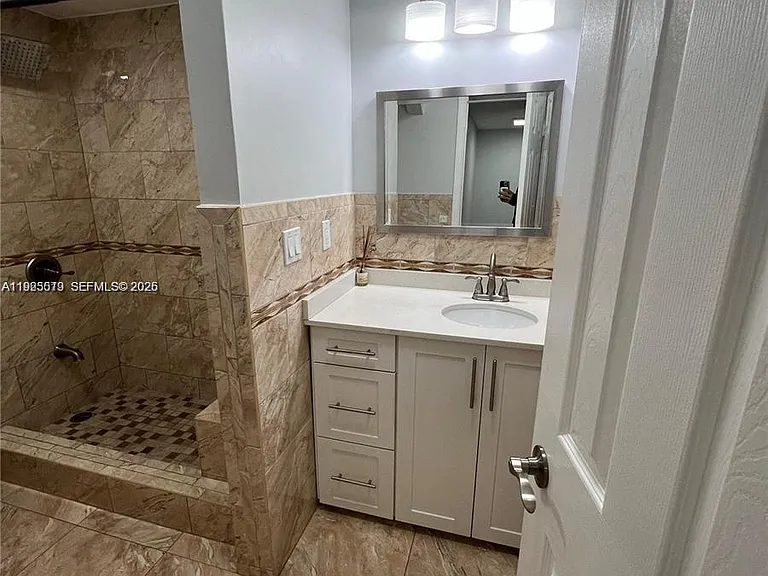 1075 W 68th St #218 — Photo 16