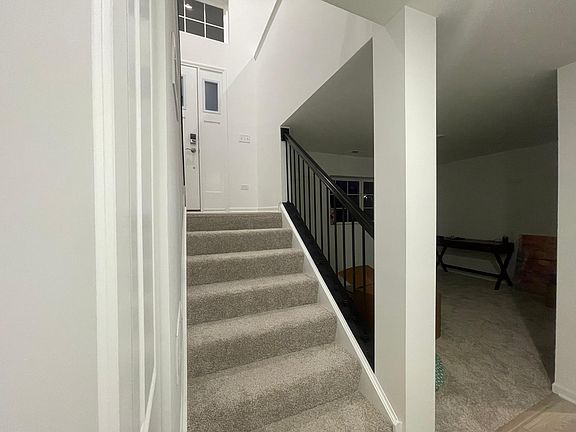 Entrance from garage.
Office area on the right.