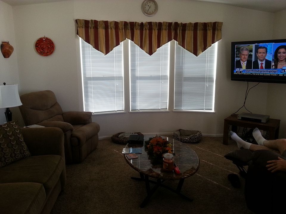 Living Room front window 
looks out on main street