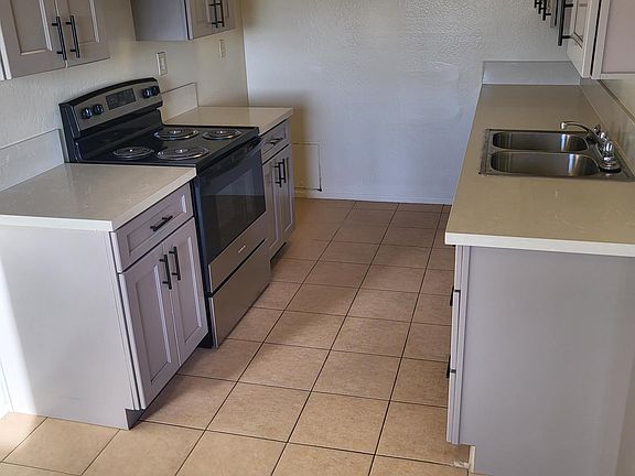 Updated kitchen cabinets and quartz countertops.