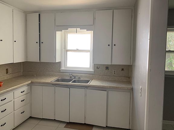 Updates to the kitchen are being completed, and a brand new refrigerator and stove will be installed prior to tenant move-in.