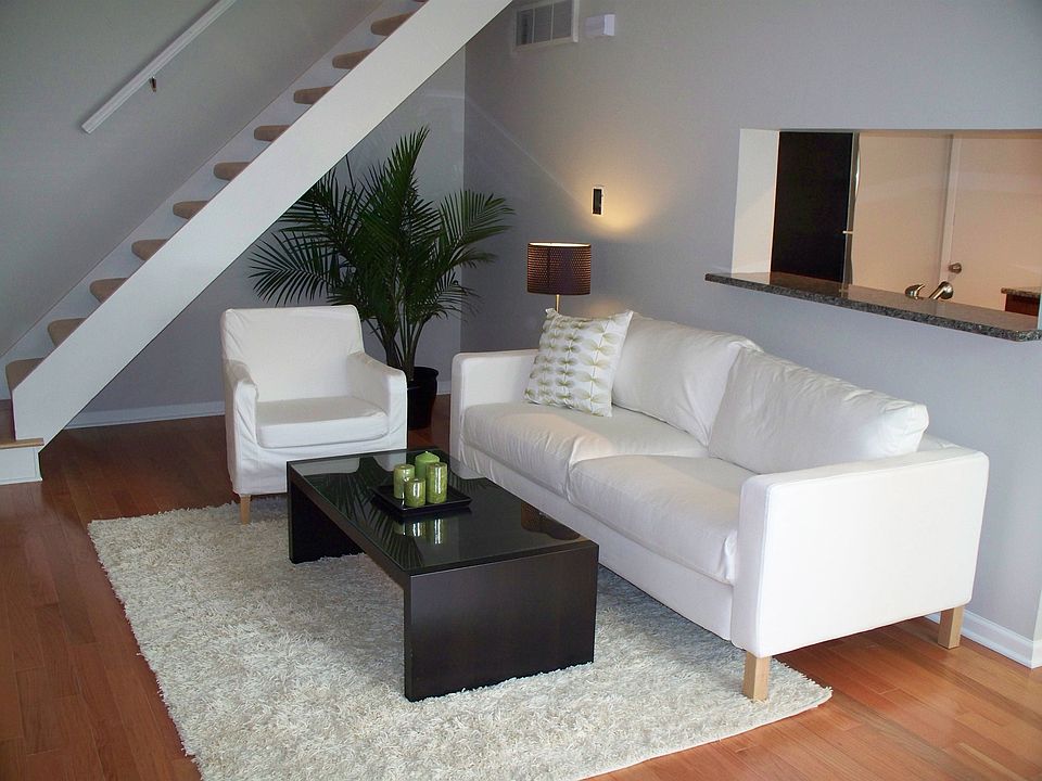 livingroom has brand new hardwood floors & canned lights