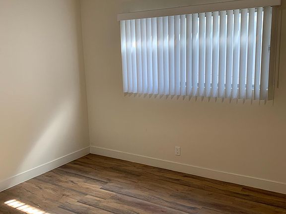 Bedroom is freshly painted with large closet.