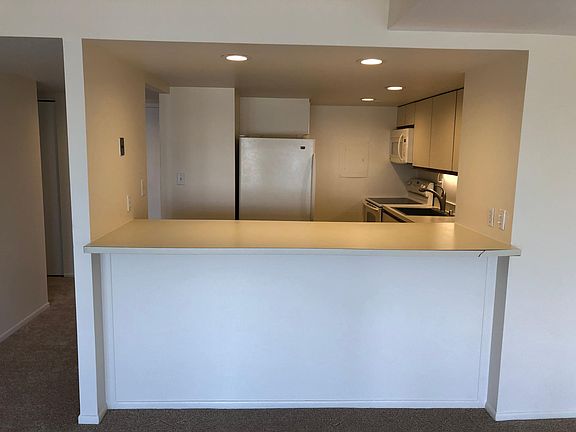 Breakfast bar and kitchen beyond