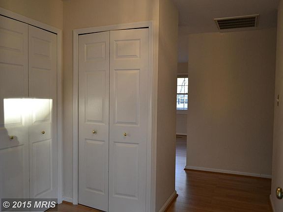 Entrance foyer with two coat closets