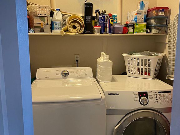 Upstairs laundry next to Master bedroom.