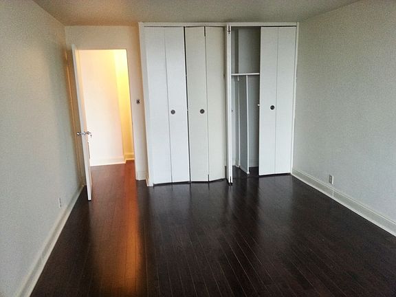 High ceiling bedroom closet (renovated w/ Container Store de