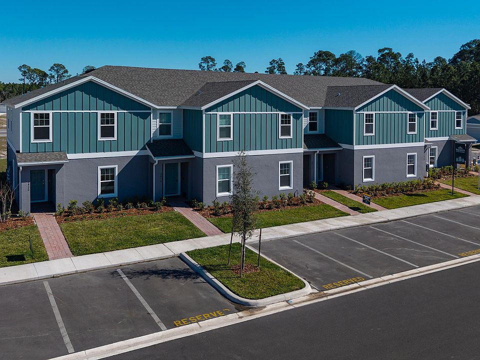 Pine Meadows Reserve Townhomes by Trinity Family Builders