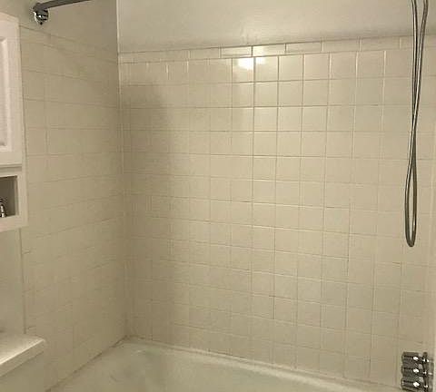 Comfortable tub with new detachable shower head.