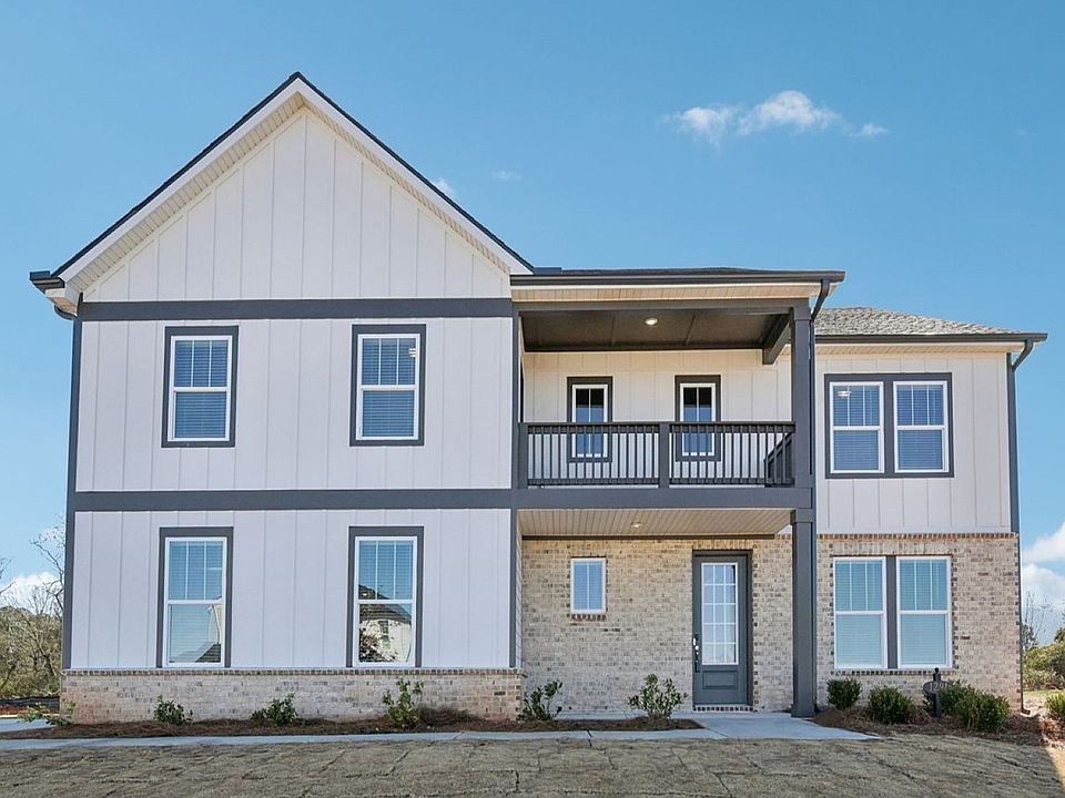 The Orchard Park floorplan with Elevation F modeled at River Pointe.