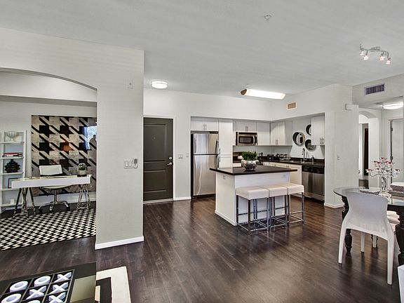 Gorgeous High End Features Connect this Kitchen, Dining, and Living Room