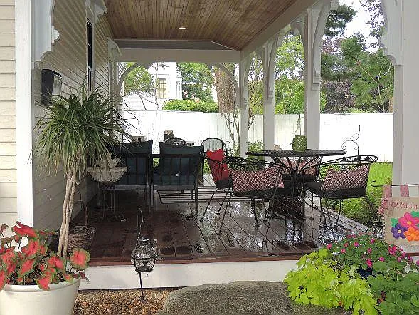 Farmers porch entrance to the apartment and commmon outdoor space
