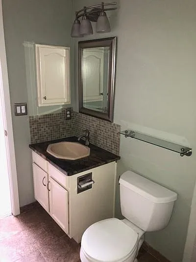 Full bath upstairs adjacent to second bedroom