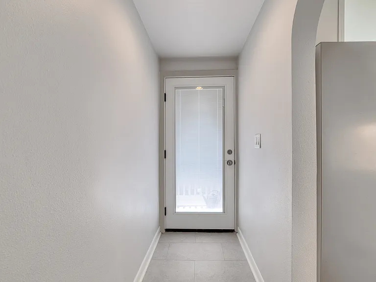 Door to Backyard and Entertainment Deck