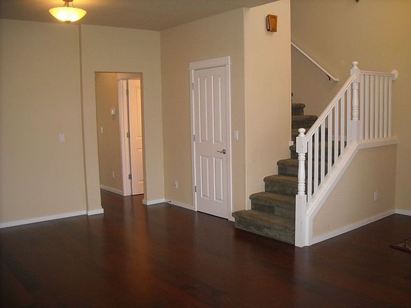 Open family room with hardwoods 