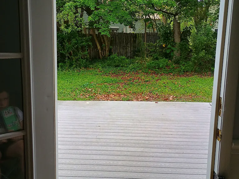 Looking out over the deck into the large back yard!