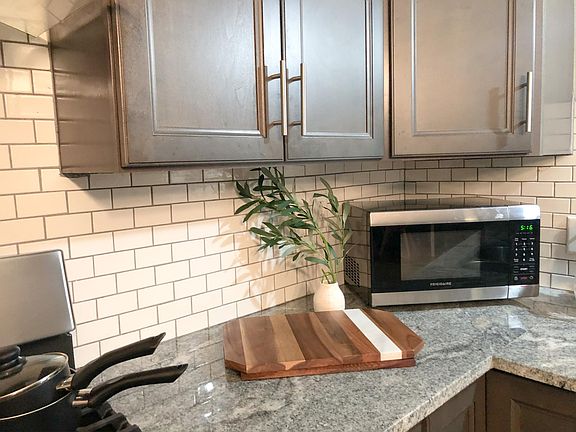 Stylish matching, cabinets and backdrop and appliances