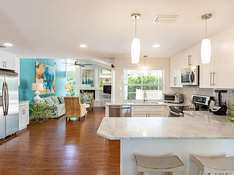 Kitchen with view of family room