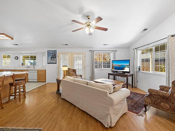 Open living room leading to dining area and kitchen