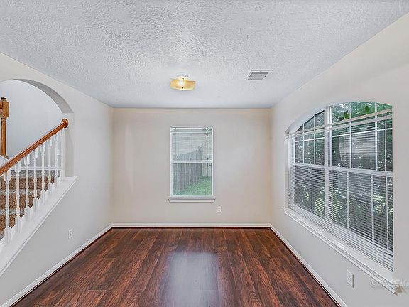 Light and bright living area could also serve as an office
