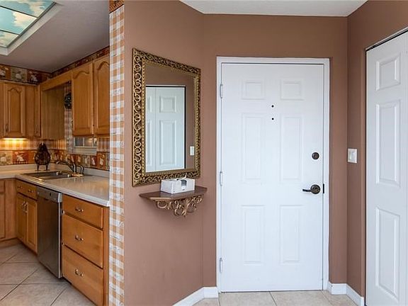 large open foyer with large size wall to wall closet