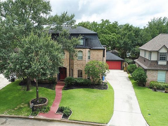 Long Double wide driveway adds plenty of parking space for guests
