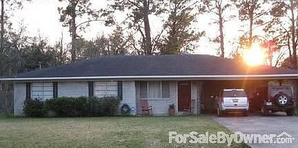 Front View
						:
						Large front and back yard. New front door, trim recently painted. Shade trees.