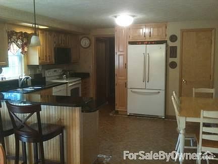 kitchen with eat in space
						:
						granite countertops, stainless sinks, upgraded appliances included.
